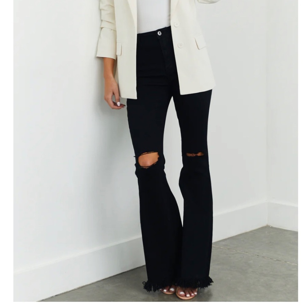 YMI Woman’s black ripped bell-bottoms!